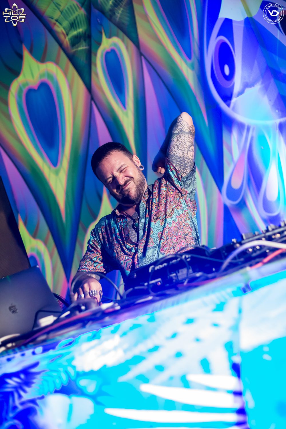 Amplify dancing behind the decks at Hilltop